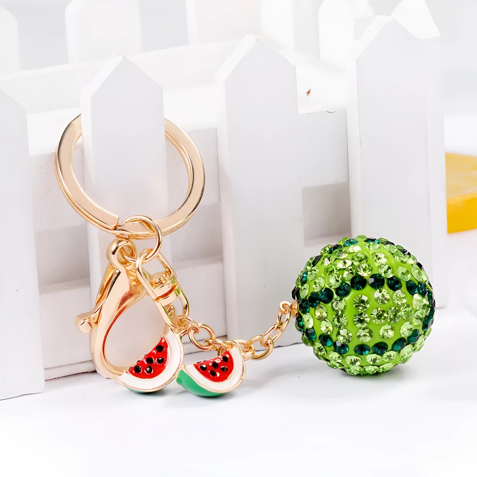 Green watermelon-shaped zinc alloy keychain with fruit diamond design measuring 12cm