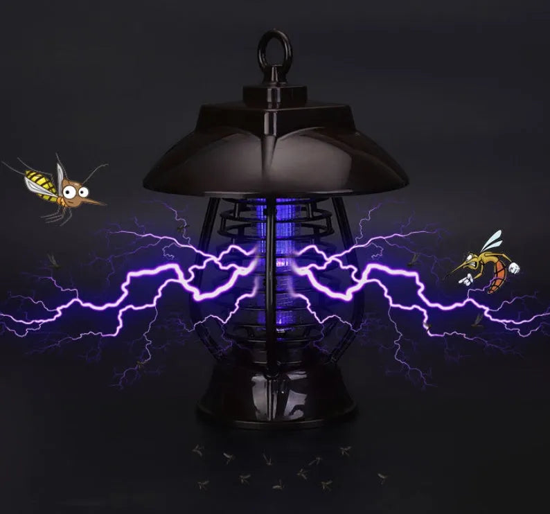 White solar mosquito lamp with purple switch, solar panel top, and LED insect attraction beads for garden outdoor use