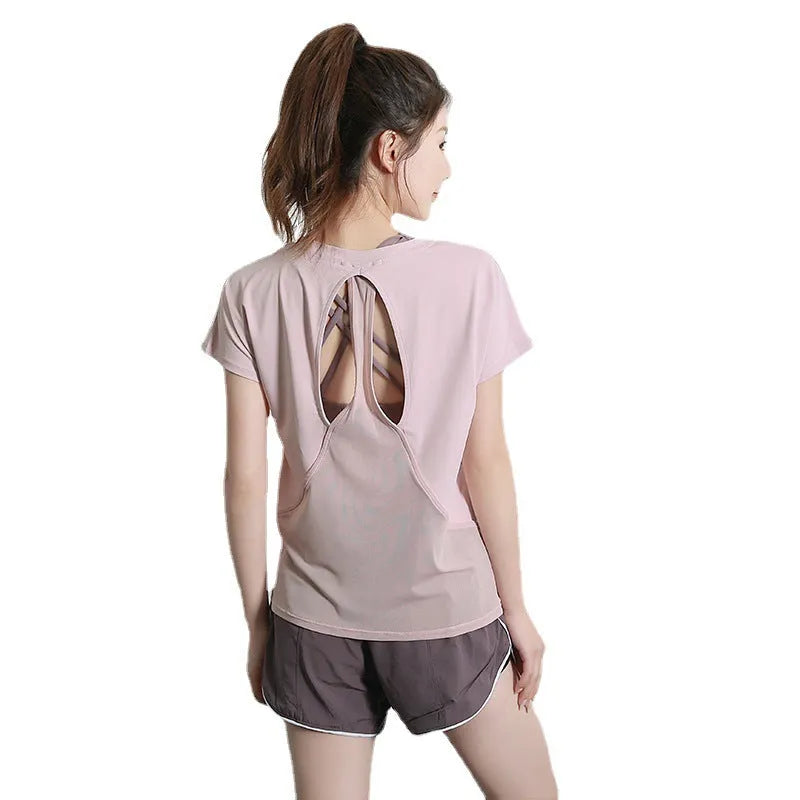 Women's short sleeve polyester sports T-shirt in grey green, shown for running and fitness activities.