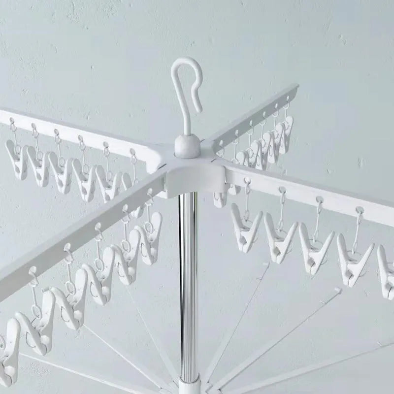Stainless steel three-layer mobile drying rack with plastic clips for socks and trousers