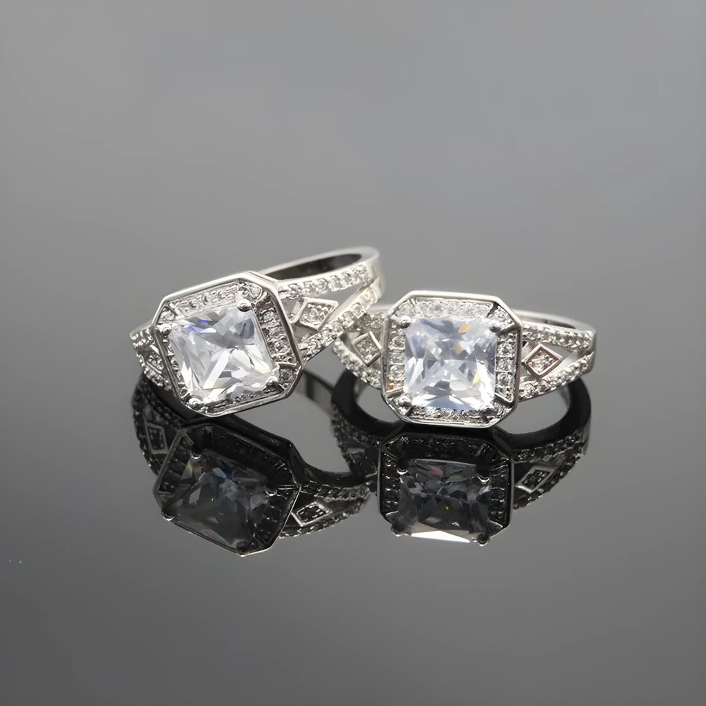 Platinum-colour geometric women's ring with hollow design and zircon inlay