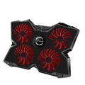 Blue LED computer cooling base with four fans and USB ports on desktop