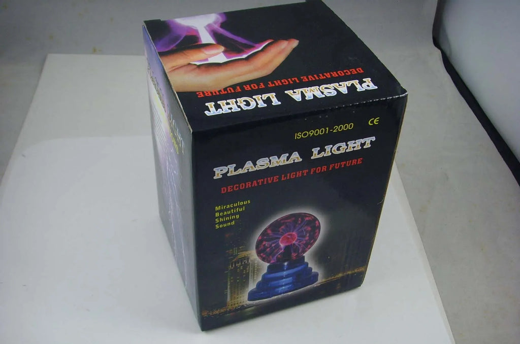 Coloured glass magic ball light on a white ABS base with a USB cable.