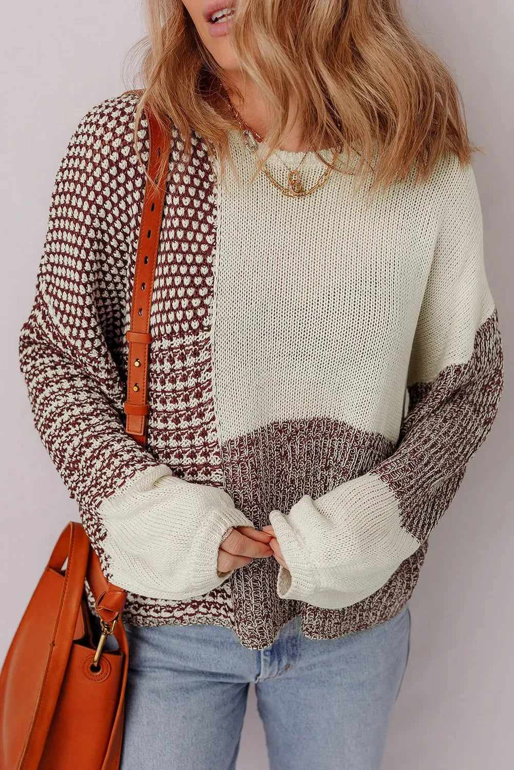 Dark khaki colour block women's loose knit sweater with drop shoulders and a back tie fastening.