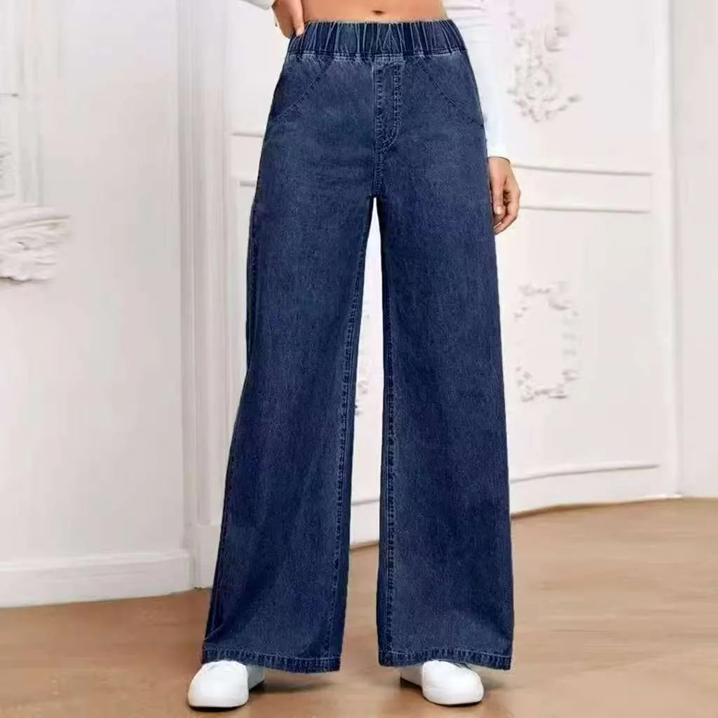 Light blue washed wide-leg women's jeans with straight trouser silhouette