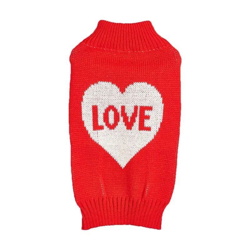 Red dog sweater with love heart design and bow decoration on small dog