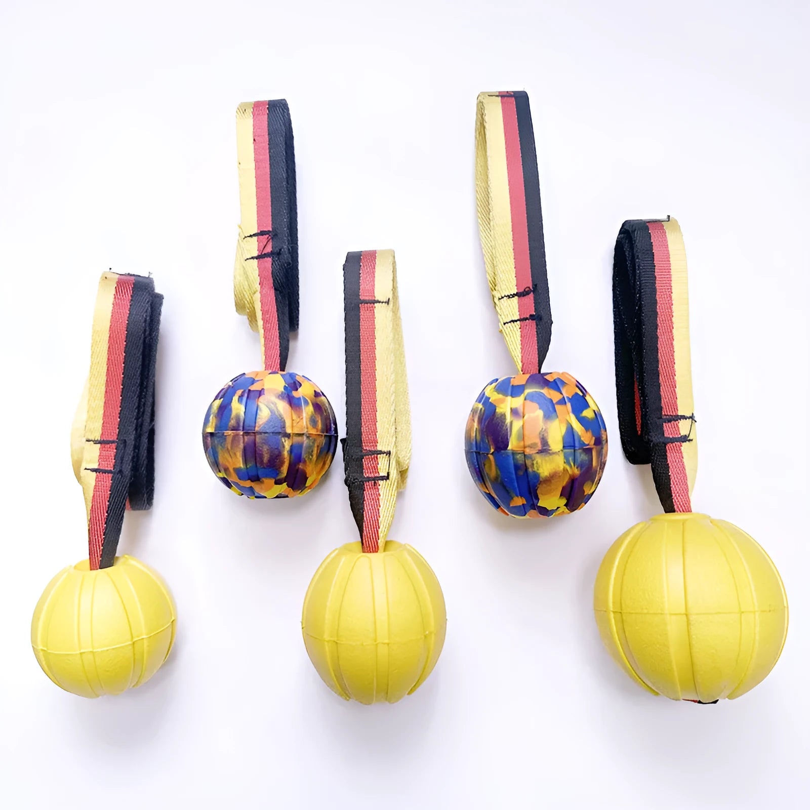 Floating EVA pet training ball with attached string in camouflage or yellow colour