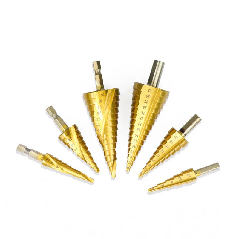 High speed steel step drill bit and centre punch set in metal case with size markings from 3mm to 32mm