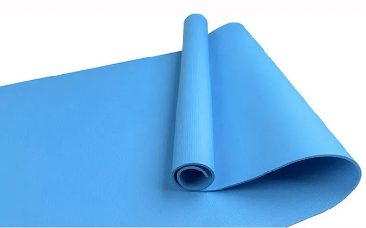 EVA yoga mat in blue showing textured anti-skid surface with thickness options