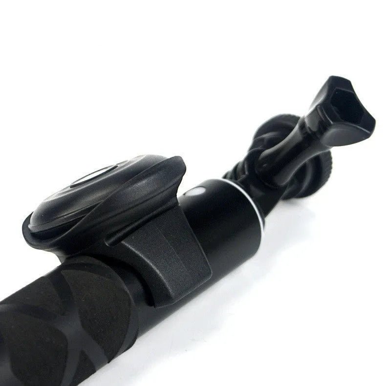 Black Snap Bluetooth remote control for wireless smartphone and camera photos.