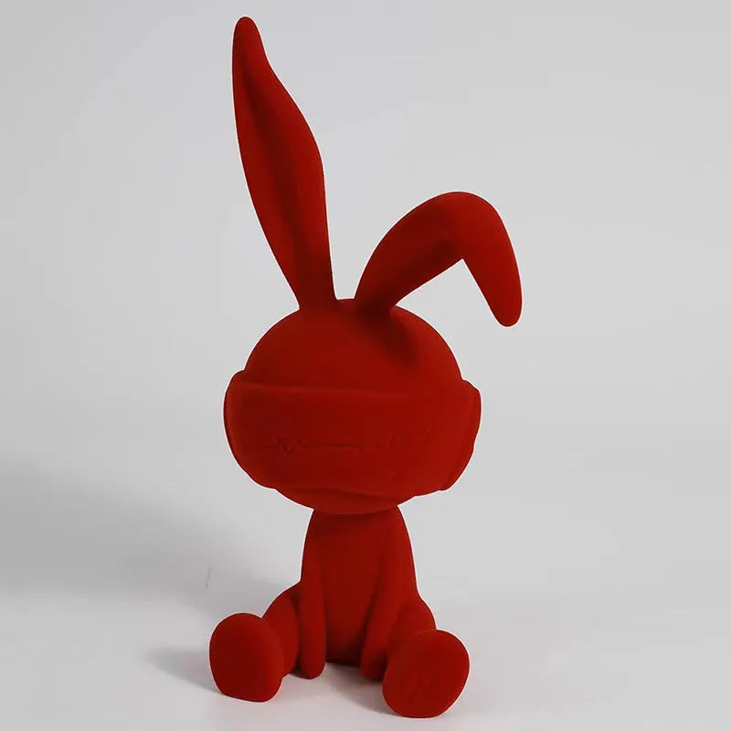 Suede blindfold rabbit resin table ornament in green, blue, or red colour options