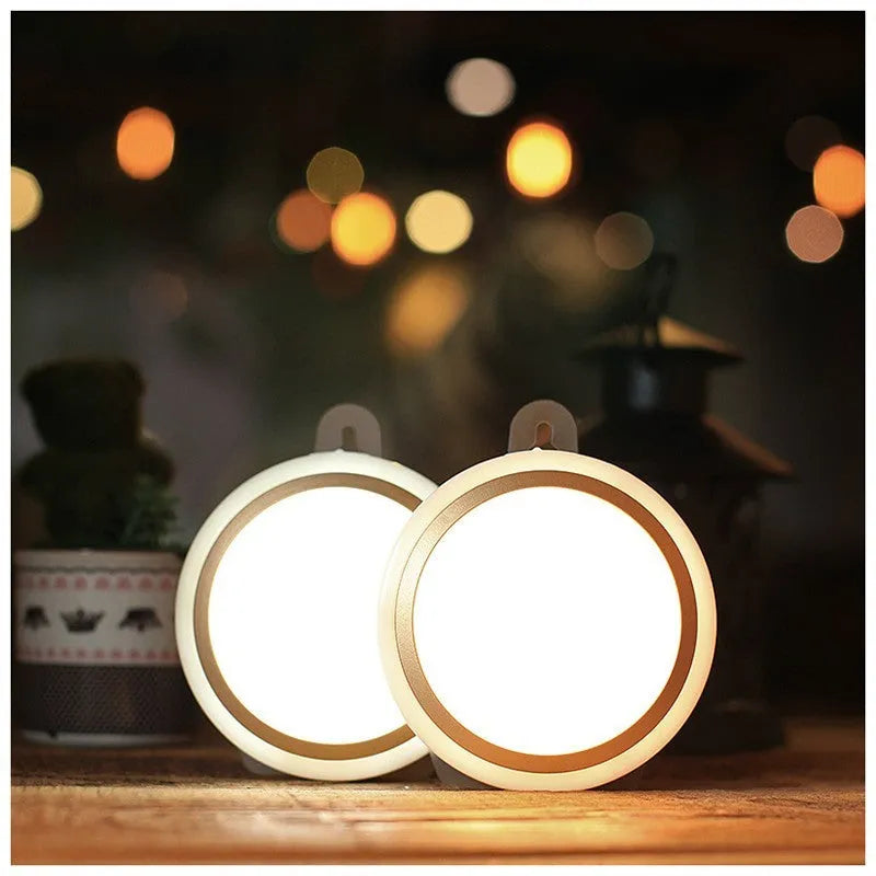 Smart battery-powered motion sensor LED night light with 80mm white casing on a wall