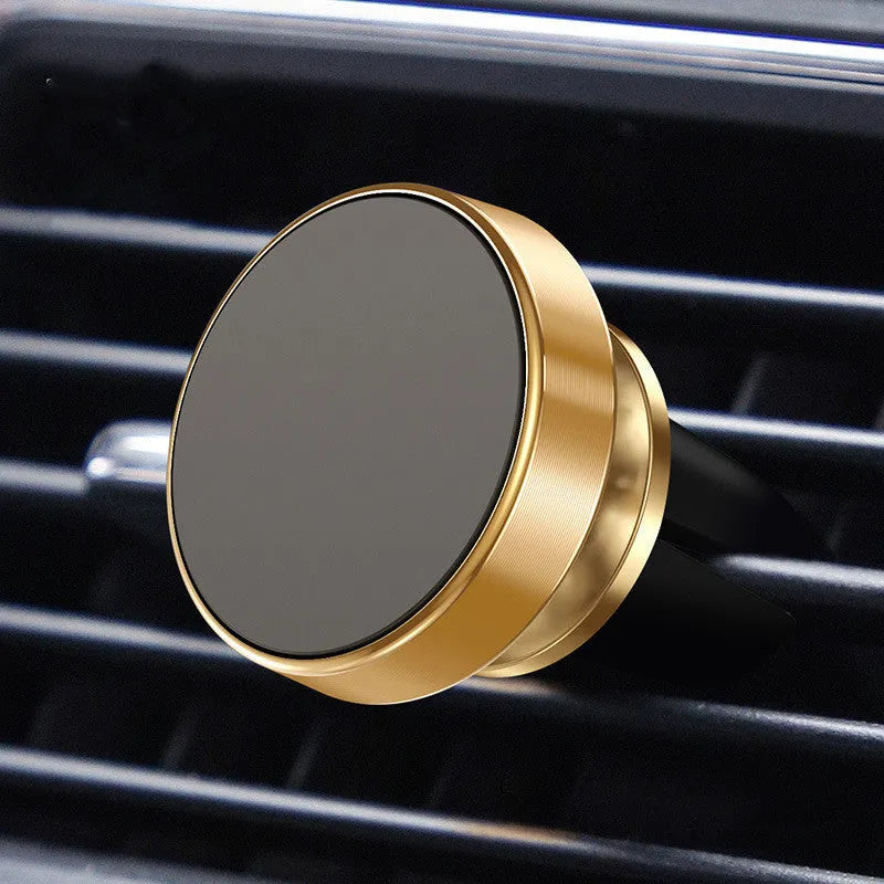 Aluminium alloy magnetic car phone holder in black, showing adhesive paste and snap-type mounting options on a car dashboard.