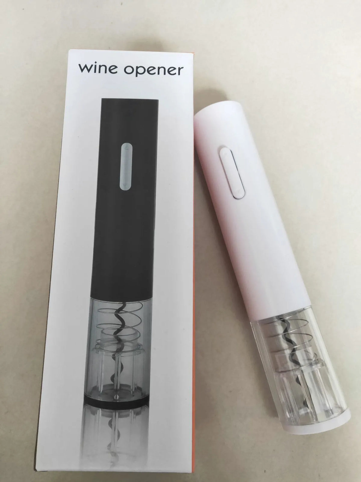 Automatic electric wine bottle opener with foil cutter in black colour showing ABS plastic construction