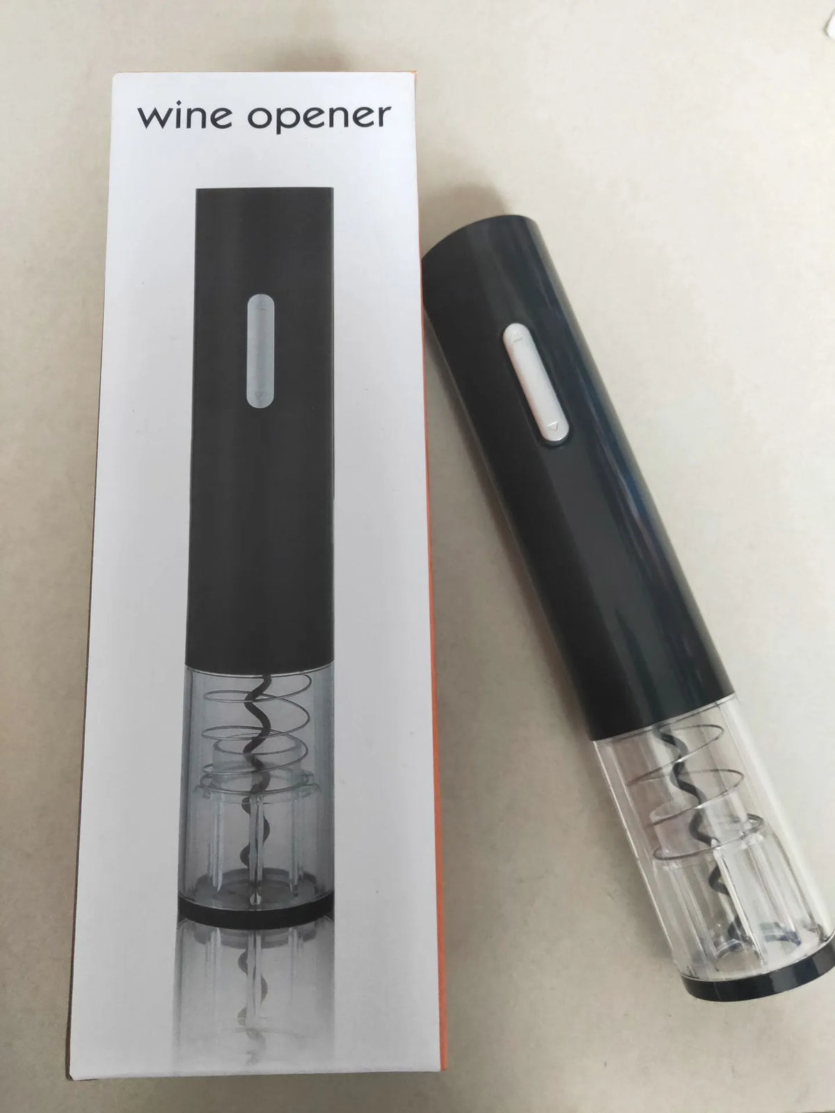 Automatic electric wine bottle opener with foil cutter in black colour showing ABS plastic construction