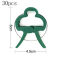 Green plastic and zinc plant fixing clips for supporting climbing tomatoes and beans