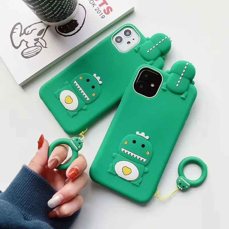 Green silicone iPhone case with cartoon animal design showing drop and waterproof protection features