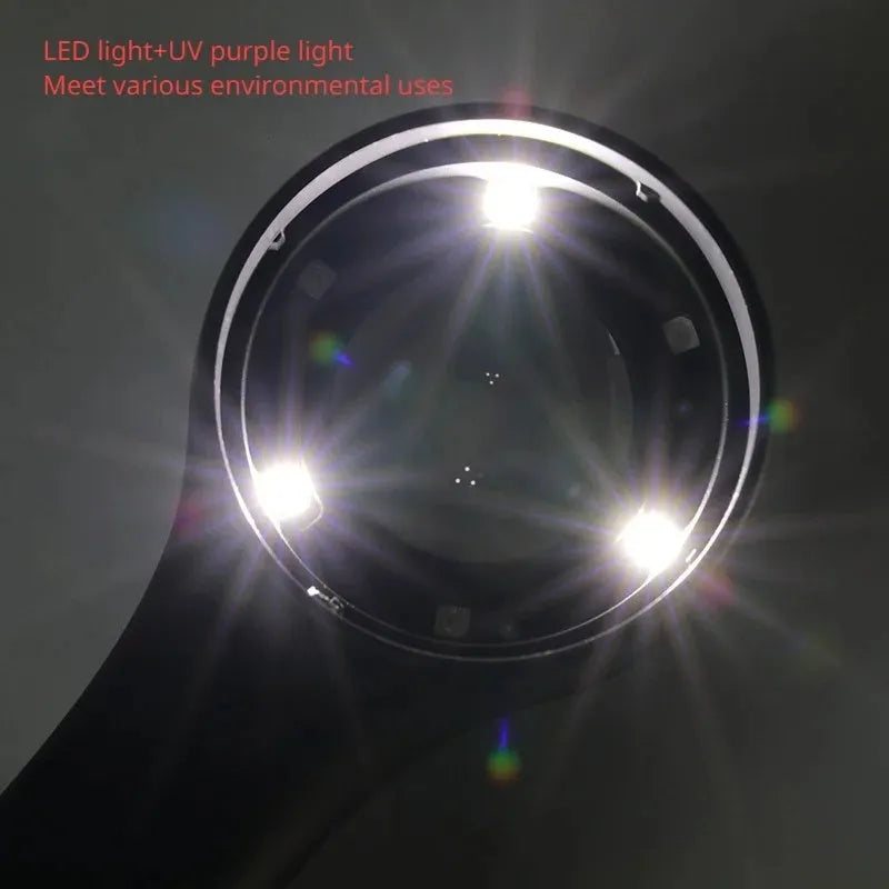 Black handheld magnifying glass with LED light for jewellery and coin appraisal.