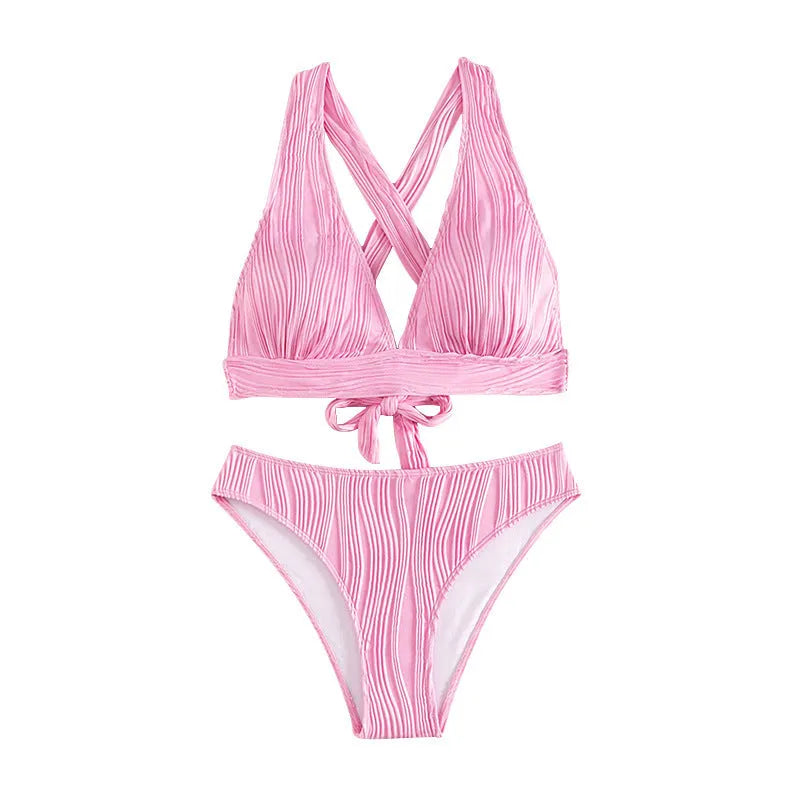 Women's black and pink halter neck bikini top with matching shorts, laid flat.