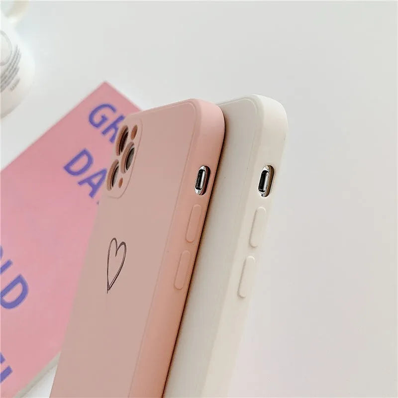 Solid colour TPU phone case for Apple iPhone in black, pink, and green showing precise cut-outs