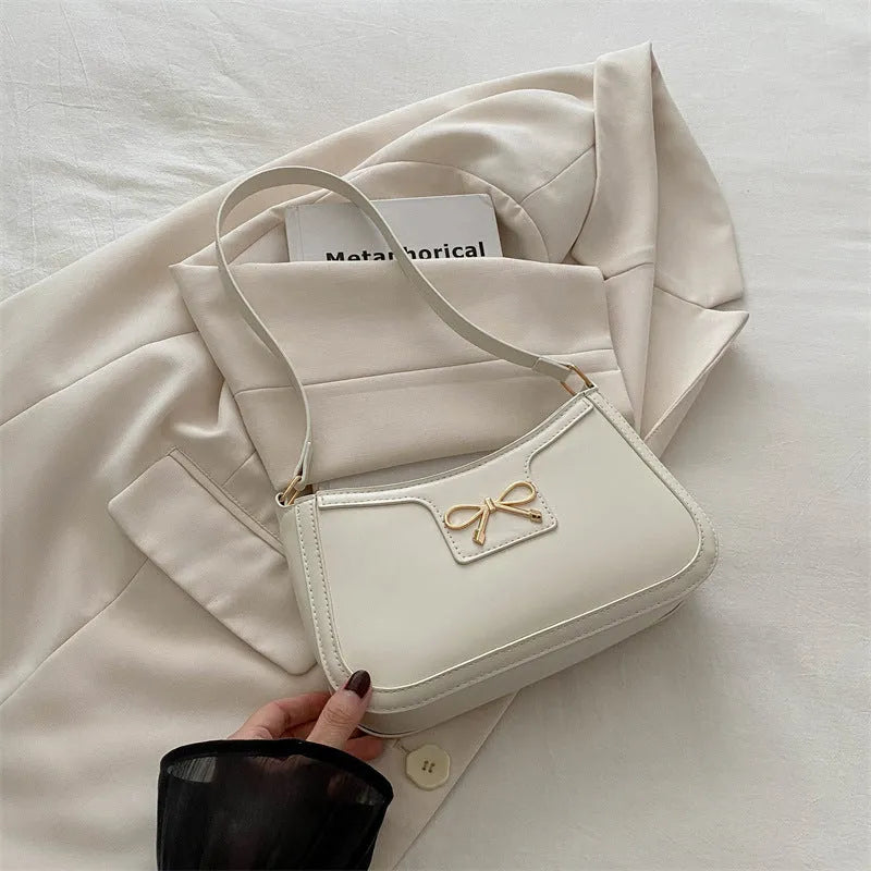 PU leather western style baguette shoulder bag with bow detail in horizontal square silhouette