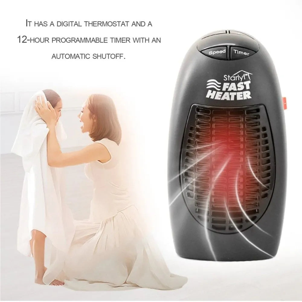 Black mini ceramic electric heater with digital display and a rotating three-prong plug on a desk.