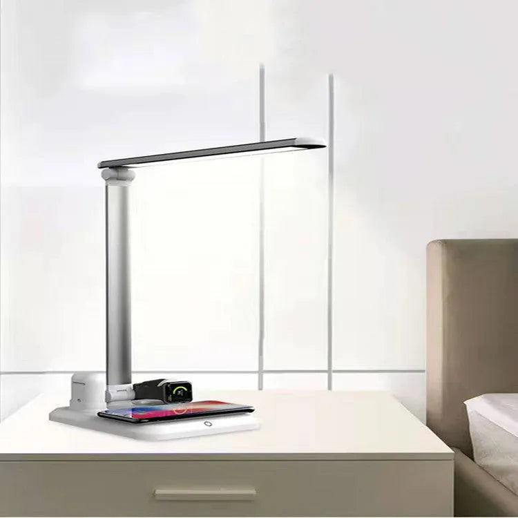 Black and white 4-in-1 LED desk lamp with wireless charging base and USB-C port