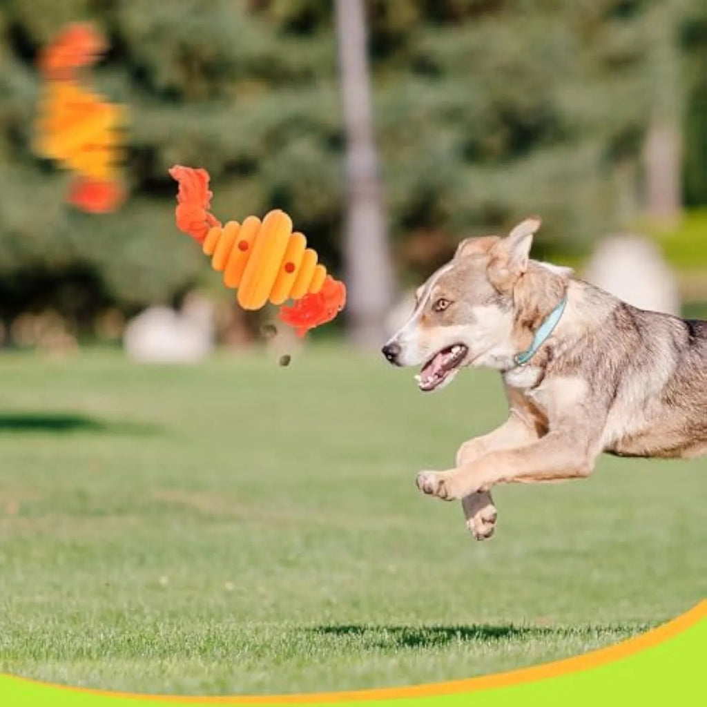 Green and yellow silicone dog ball with knotted rope, a treat-dispensing toy for large dogs.