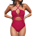 Black women's strapless one-piece swimsuit with cross-back detail on a mannequin.