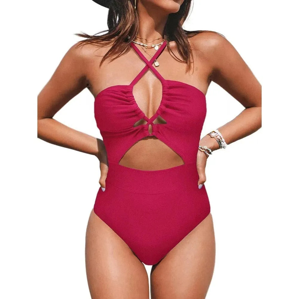 Black women's strapless one-piece swimsuit with cross-back detail on a mannequin.