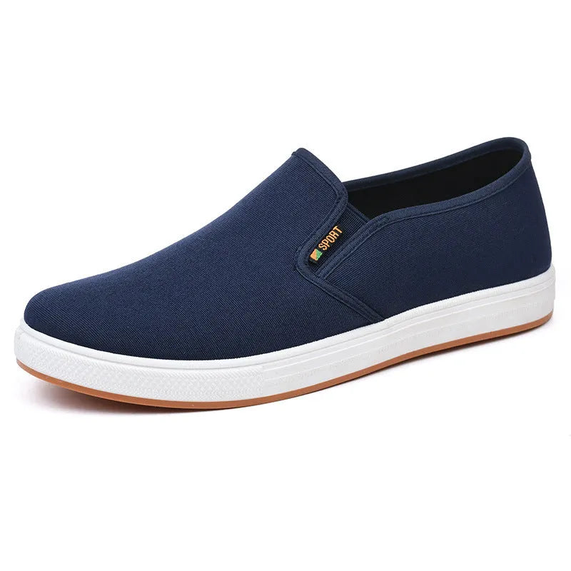 Men's low-top slip-on cloth shoes in canvas with round toe and injection moulded sole