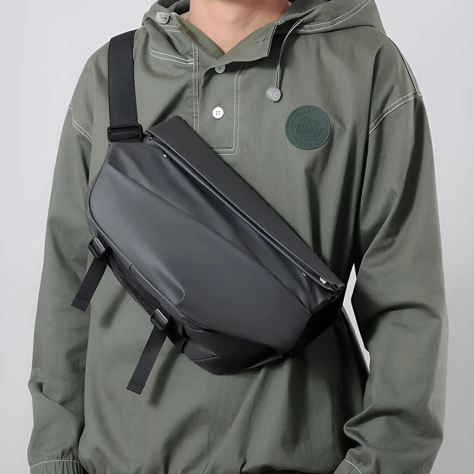 Men's black PU leather crossbody sling backpack with shoulder strap and zipper opening