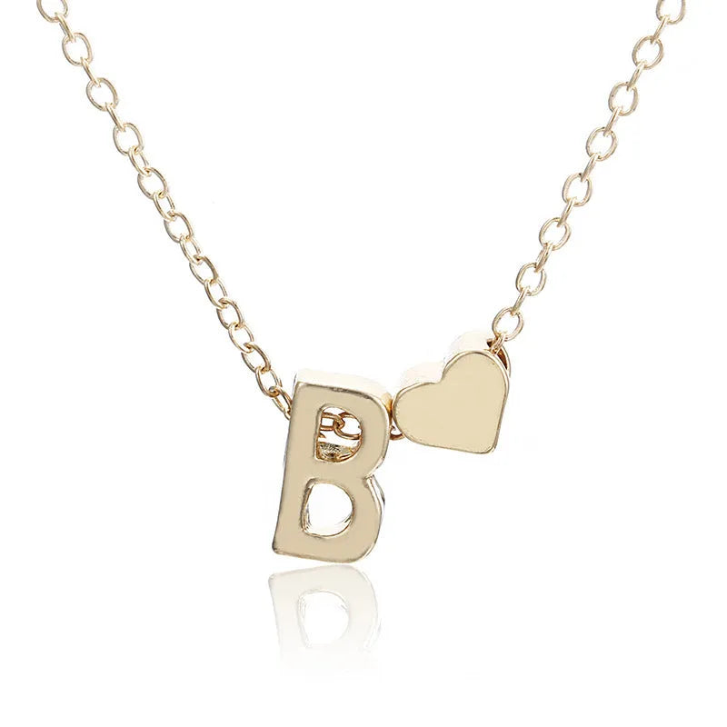 Peach heart shaped letter necklace pendant in gold and silver tone alloy jewellery