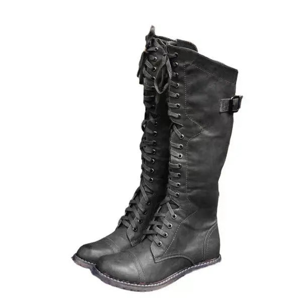 Women's chunky heel high leg boot in solid colour with round toe and low heel design