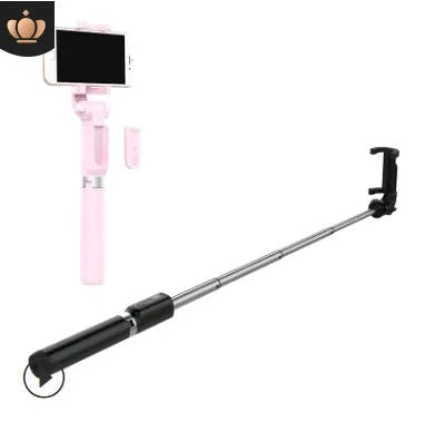 Bluetooth selfie stick tripod with remote control extended with smartphone attached