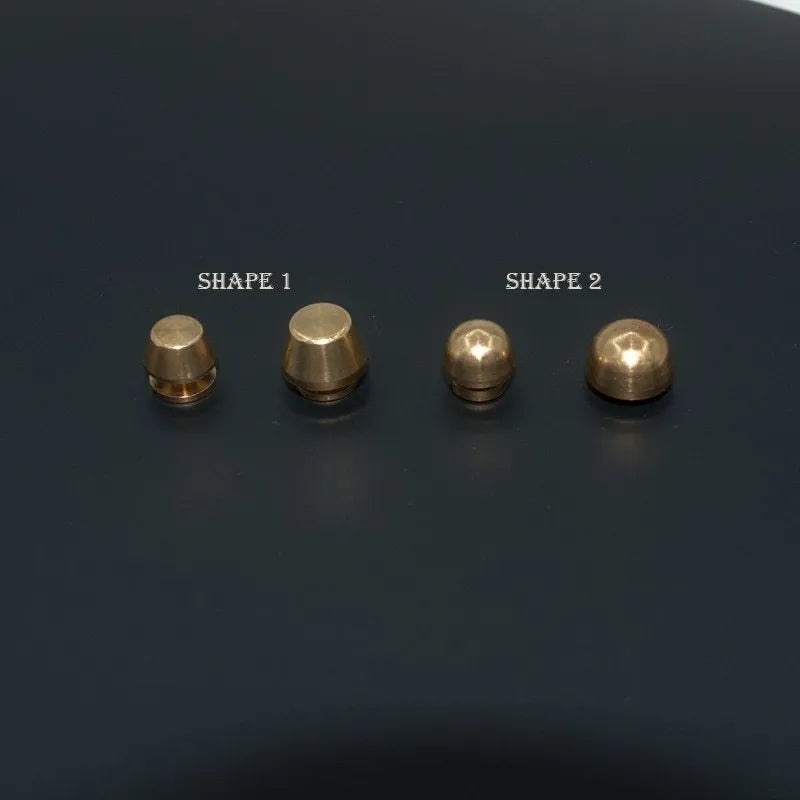 Brass decorative buckles in 10x6mm and 12x7mm sizes with round and geometric foot nail designs