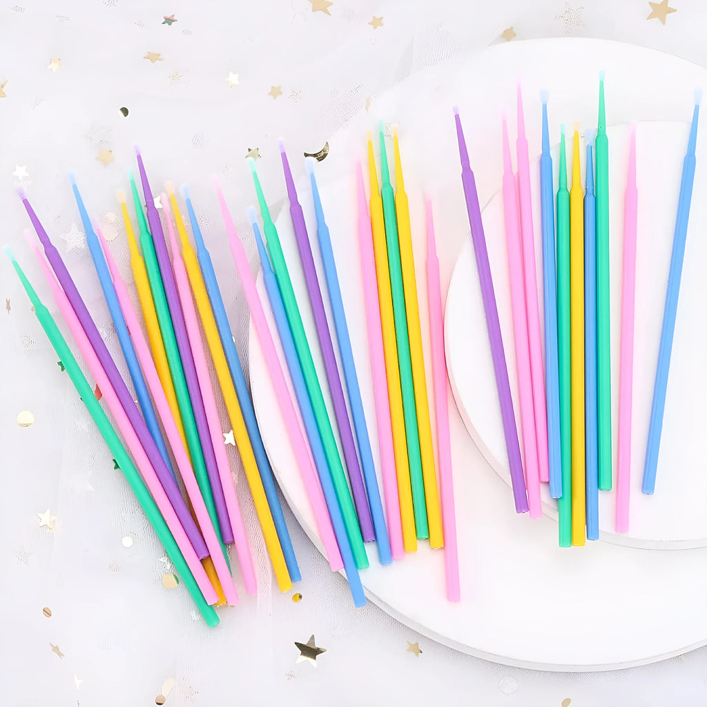 Disposable micro applicator brushes with bendable cotton tips and colour-coded handles for eyelash extensions