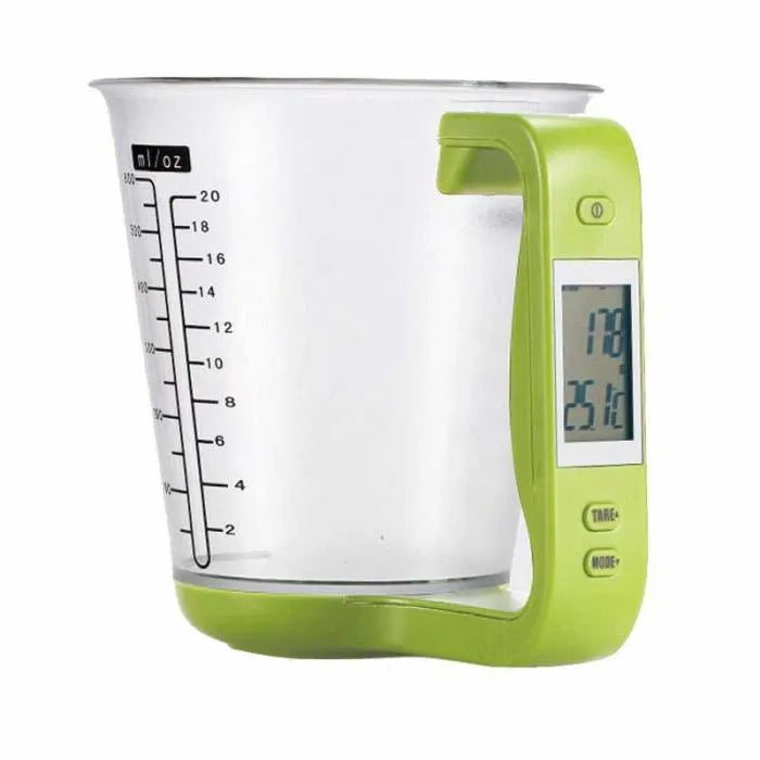 Green digital kitchen measuring cup with integrated LCD display showing weight and temperature measurements