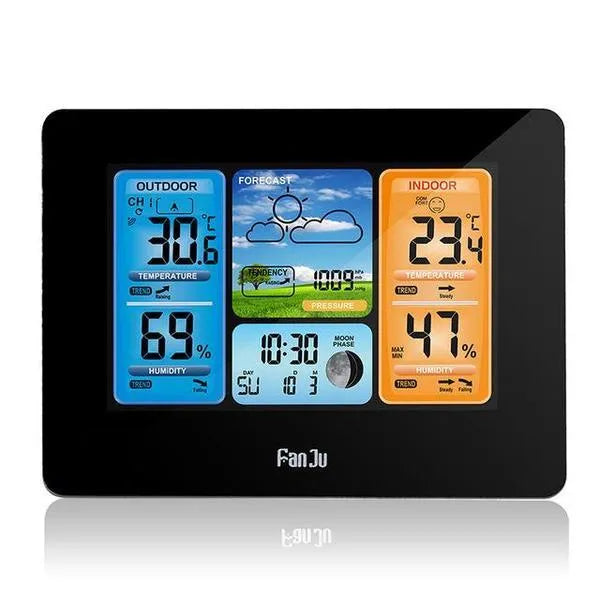 Digital weather station clock with LCD display showing temperature humidity and forecast in black plastic case