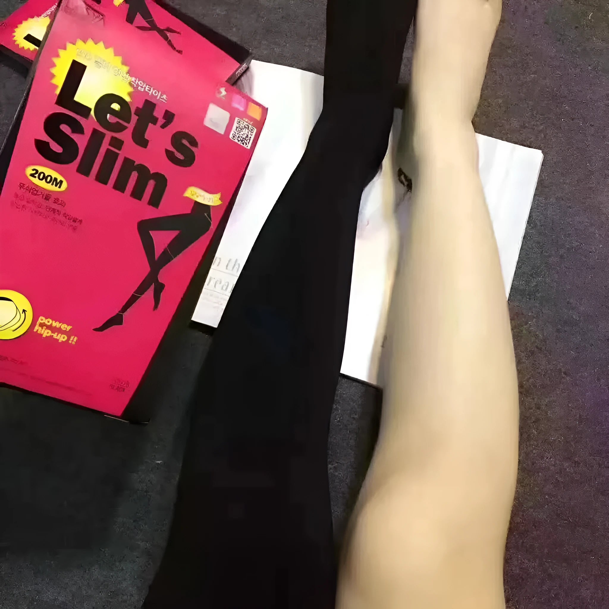 Beige and black stovepipe socks for lifting hips and abdomen, made from polyester fibre.