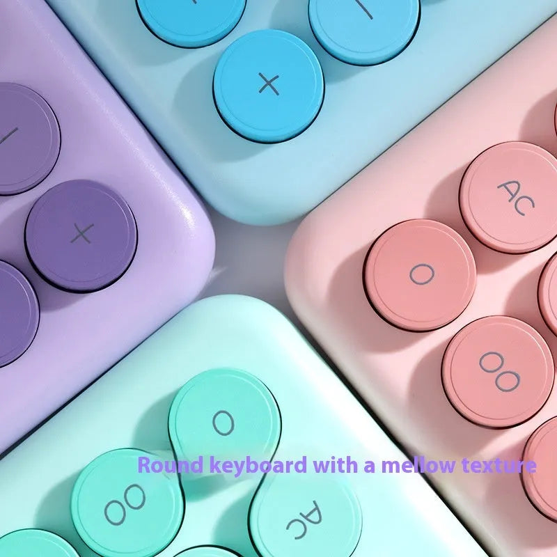 Gradient colour desk calculator showing violet, pink, blue and green colour options