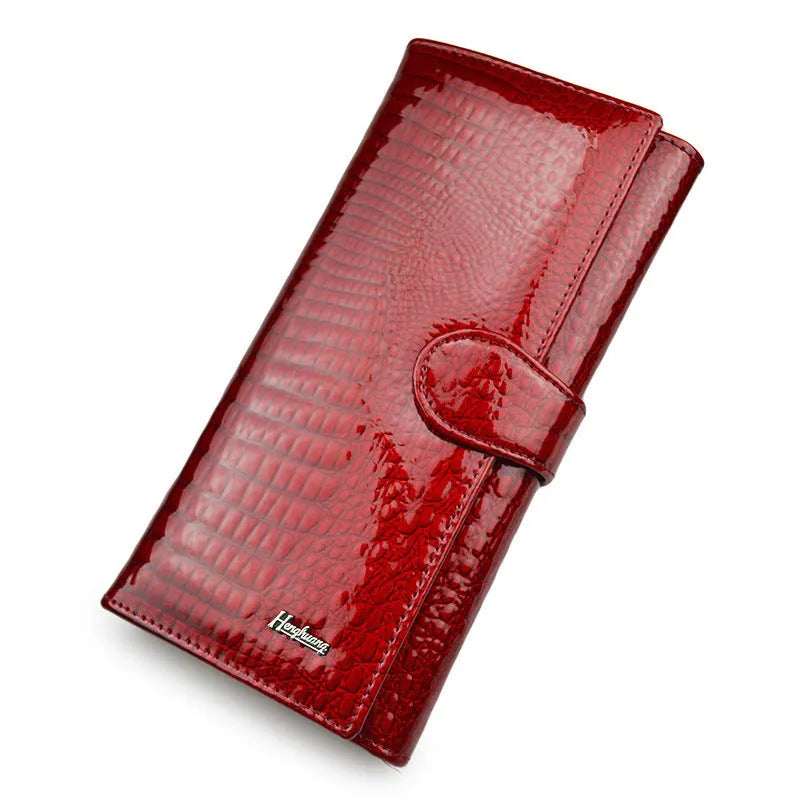 Women's patent leather coin purse with crocodile pattern in red colour
