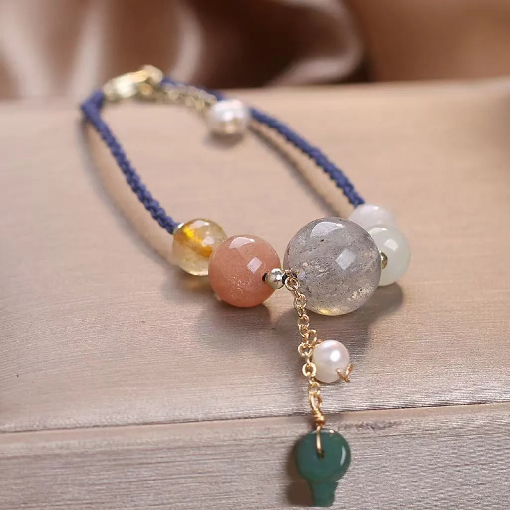 Hand-woven peace buckle bracelet with crystal beads and sequins in red, green, or blue colour options