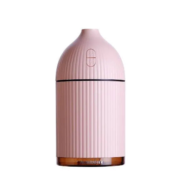 White USB-powered 300ml aromatherapy diffuser with LED light showing compact dimensions