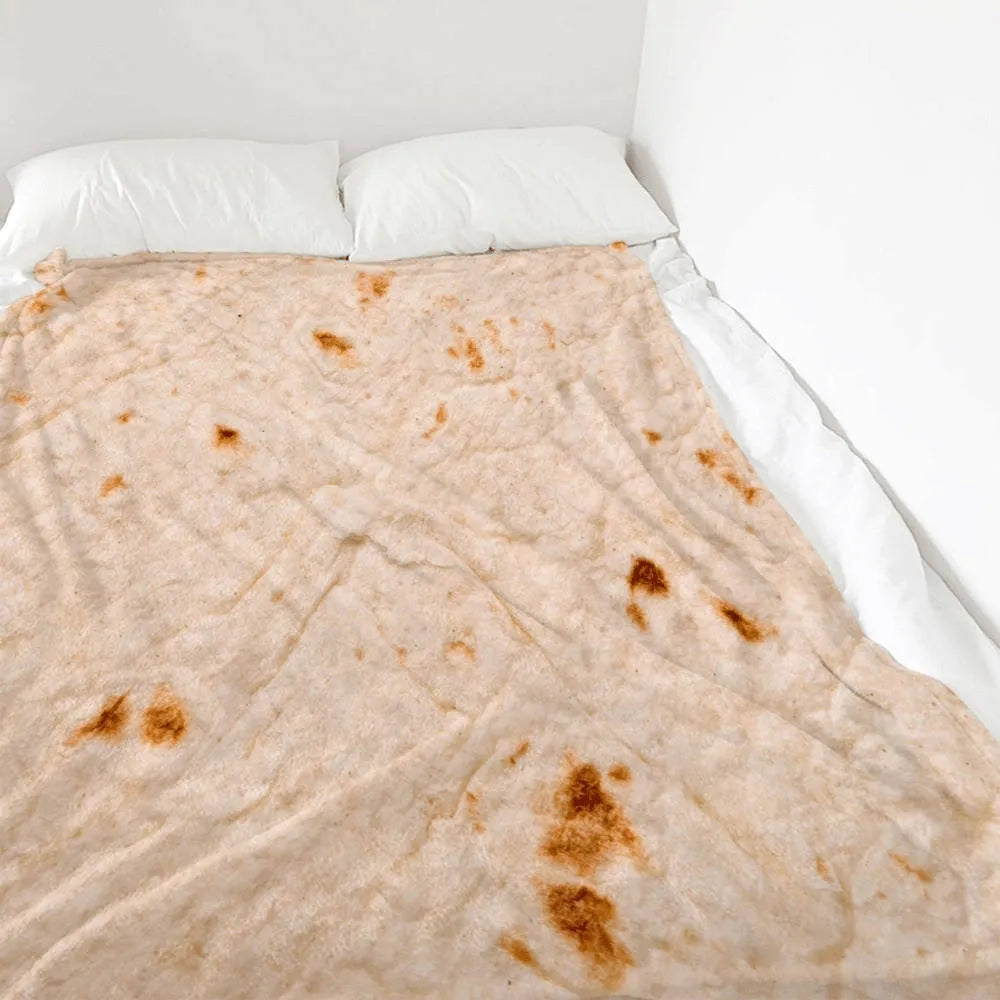 Round burrito blanket with coral fleece texture and food-themed print