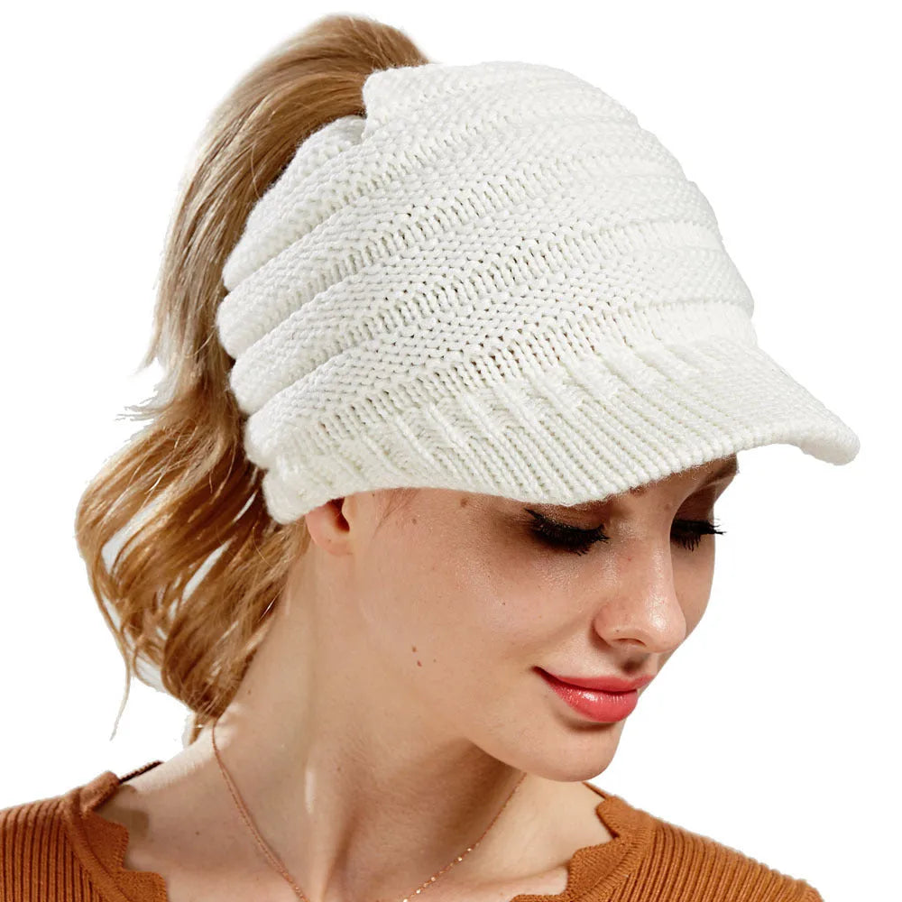Women's acrylic yarn ponytail beanie hat in various colours showing hairstyle accommodation