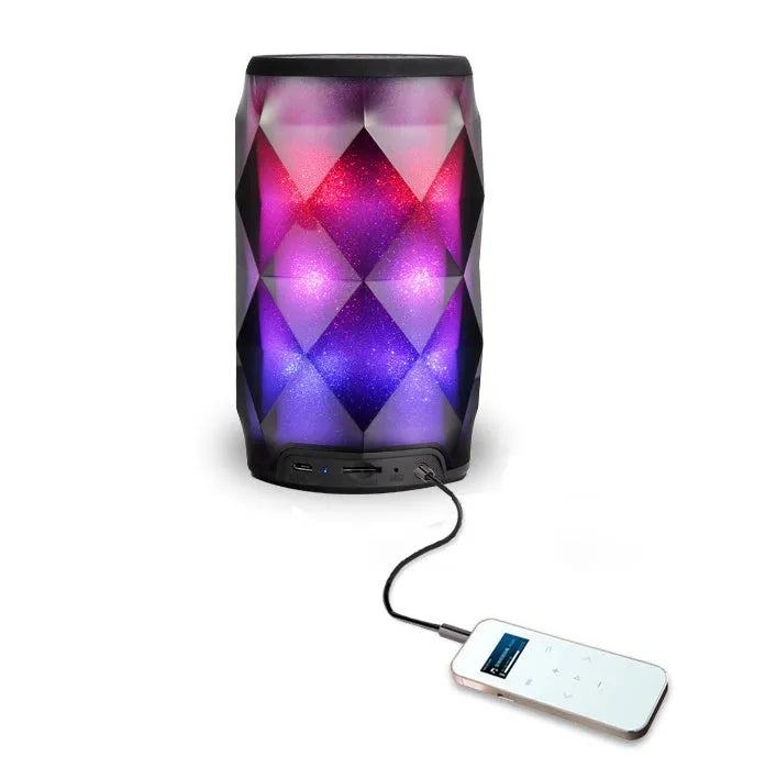 Black crystal Coca-Cola can lantern speaker with diamond-cut design and colourful starry sky lighting effect.