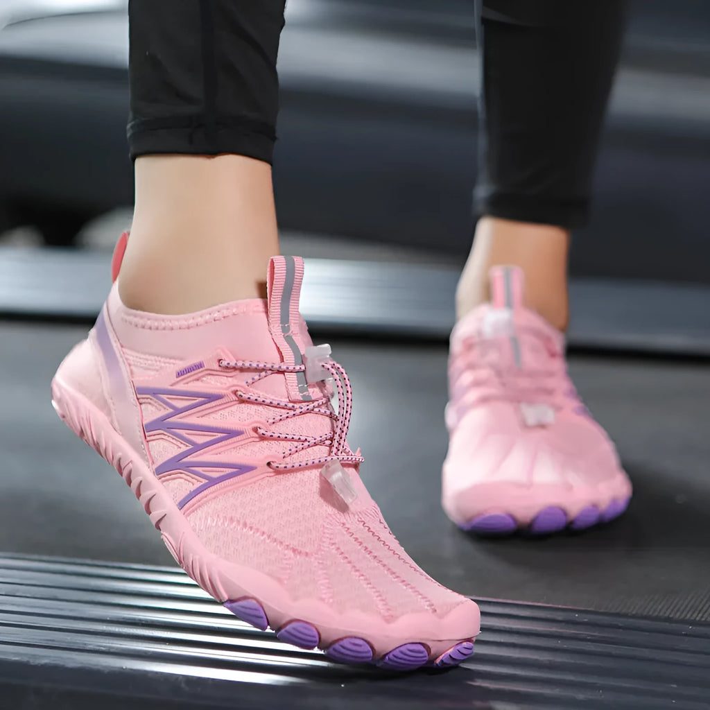 Lightweight training sneakers with striped pattern and non-slip rubber sole shown in multiple colour options.