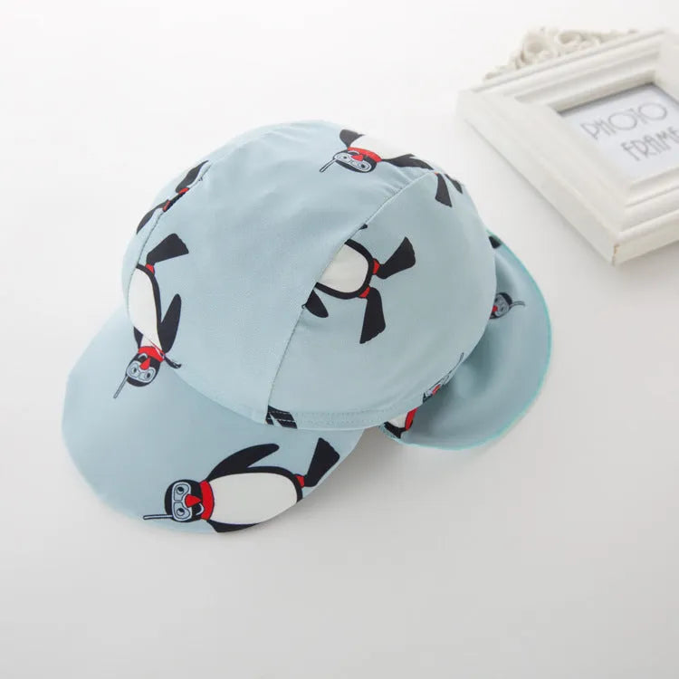 Boys' long sleeve penguin swimsuit with matching swimming cap for beach and pool use