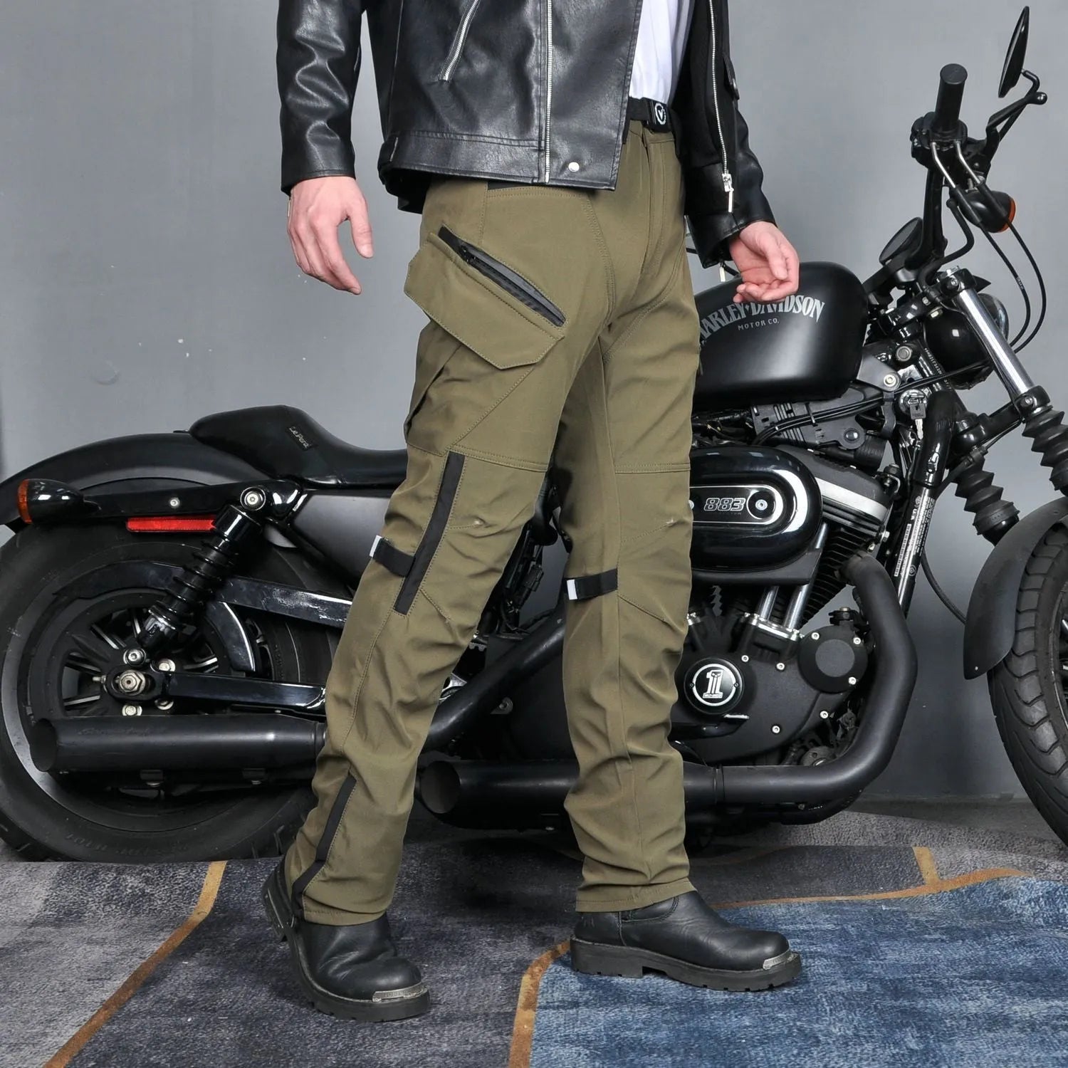 Men's solid color waterproof motorcycle cycling pants with protective gear and belt in black or green